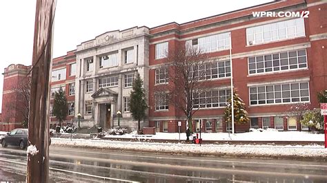 VIDEO NOW: Snow cleanup outside of Cranston East High School