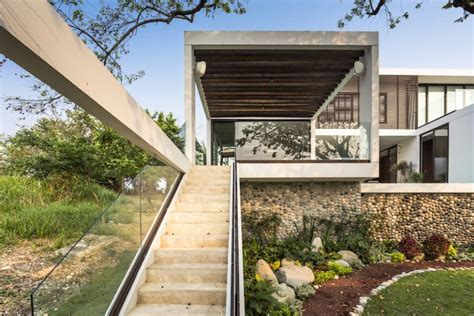 Eco-Friendly House Follows The Slope To Capture The Views