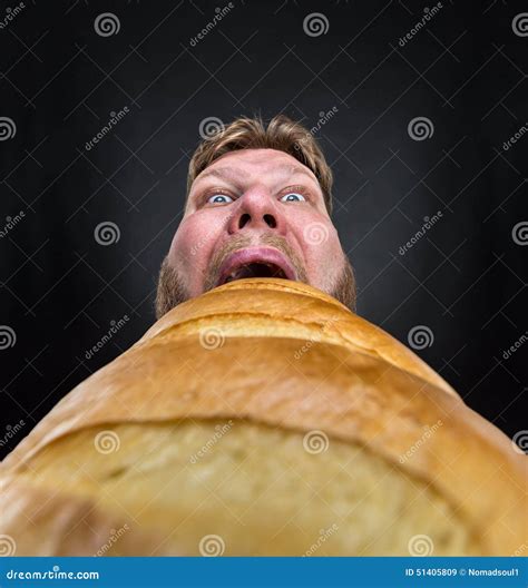 Man eating a big bread stock image. Image of huge, bakery - 51405809