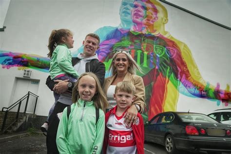 James McClean and family all smiles as they pose in front of new mural of Ireland ace in his ...