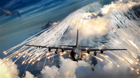 An AC-130U gunship jettisons flares Aug. 20 over an area near Hurlburt Field, Fla. : r/MilitaryFans