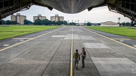 On the ground at Yokota Air Base, the Air Force transport hub of the Pacific