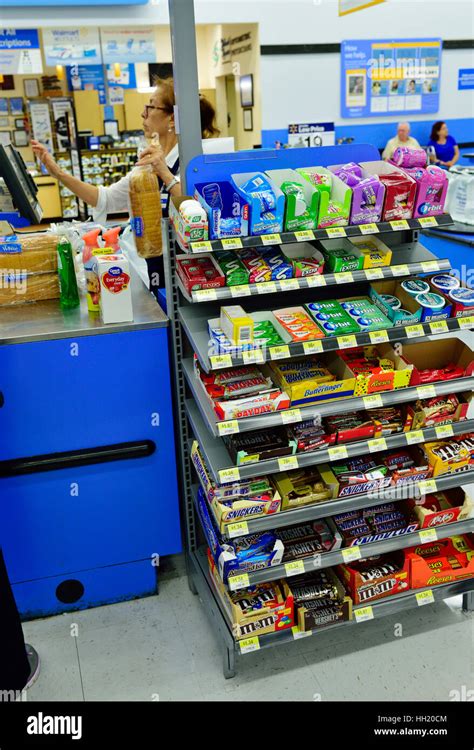 Sweets, candy, gum retail display next to supermarket checkout counter ...