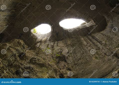 The Eyes Of God In Prohodna Cave, Famous Cave Royalty-Free Stock Photography | CartoonDealer.com ...