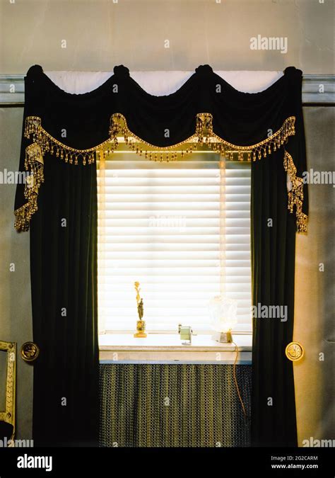 Black and gold curtains Stock Photo - Alamy