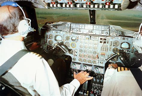 Concorde Pilots In Cockpit Photograph by Us National Archives - Pixels