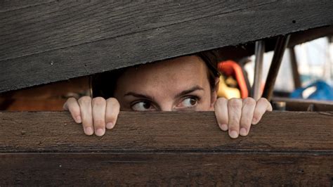 FREE IMAGE: Woman playing hide and seek | Libreshot Public Domain Photos