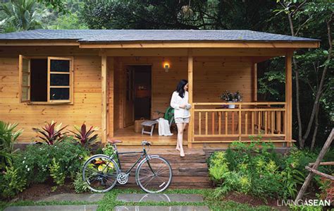 A Little Wood Cabin Nestled in the Lush Green Countryside / Living Asean