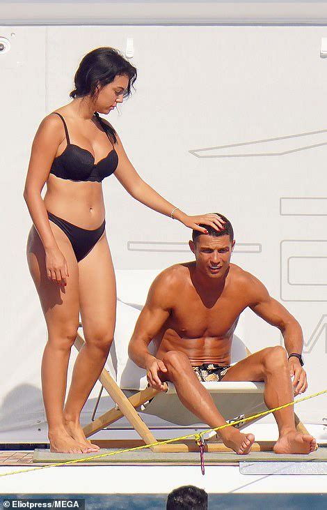 Cristiano Ronaldo and his partner Georgina Rodriguez soak up the sun ...