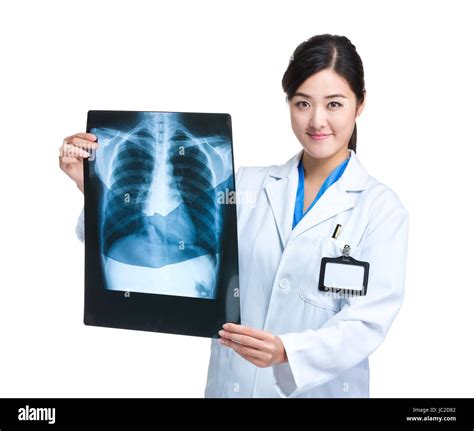 Doctor hold with x ray film Stock Photo - Alamy