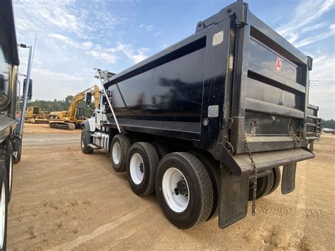 2023 MACK GR64F Dump Truck - J.M. Wood Auction Company, Inc.