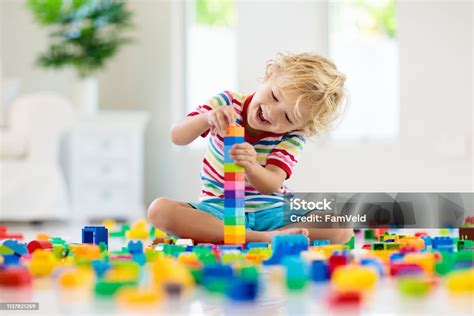 Child Playing With Toy Blocks Toys For Kids Stock Photo - Download Image Now - Child, Playing ...