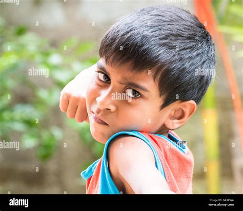 Kid showing emotions of Anger, hate, disgust and distress Stock Photo - Alamy