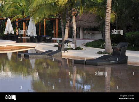 Infinity Pool at a resort in Cancun Mexico Stock Photo - Alamy