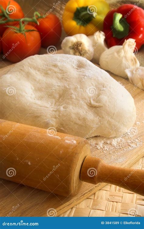 Pizza Dough and Rolling Pin Stock Image - Image of restaurant, chef: 3841589