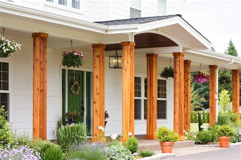 Adding Cedar Pillars to our Dream House | House front porch, Front porch design, House with porch