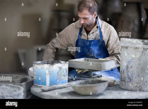 Sculpting and shaping pottery Stock Photo - Alamy