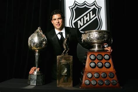 Sidney Crosby With The Hart Memorial Trophy, Lester B. Pearson Award ...