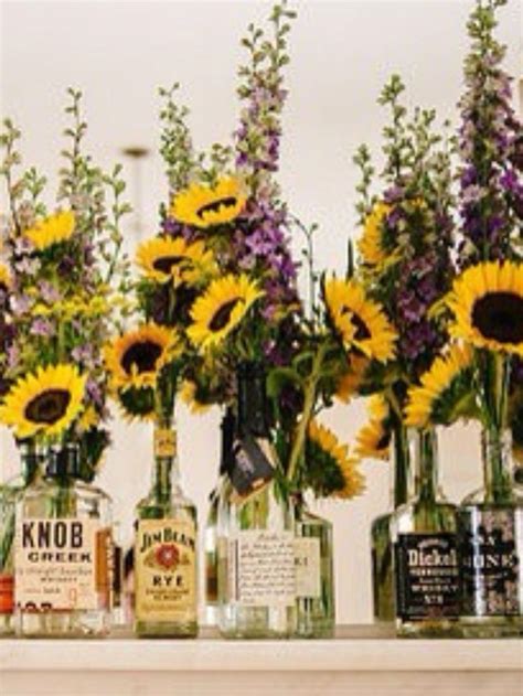 Great idea empty liquor bottles. | Wine bottle centerpieces, Liquor bottle crafts, Empty liquor ...