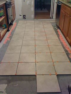 kitchen diy: floor progress | kitchen floor gets heat and ti… | Flickr