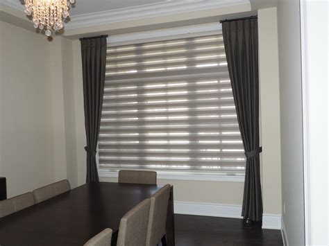 Our pleated-style combi roller blinds in grey goes well with reverse pleat side panel dark taupe ...