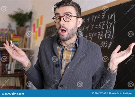 Very Confused Teacher in Classroom Stock Image - Image of arms, high: 224205767