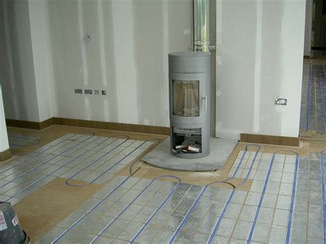 Residential underfloor heating installation | Underfloor heating installation, Heat installation ...