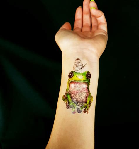 Details more than 76 simple small frog tattoo latest - in.cdgdbentre