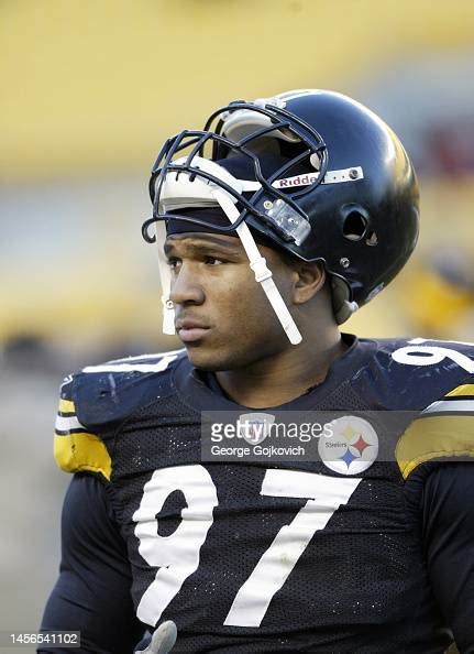 Linebacker Kendrell Bell of the Pittsburgh Steelers looks on from the ...