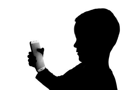 Silhouette Boy With Telephone Free Stock Photo - Public Domain Pictures