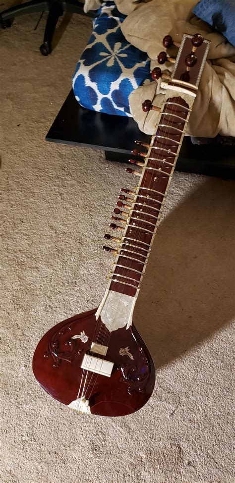 Friend gave me his sitar and it just needs new strings, and knowing ...