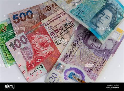 The British Pound Sterling banknotes and the Hong Kong Dollars bank notes Stock Photo - Alamy