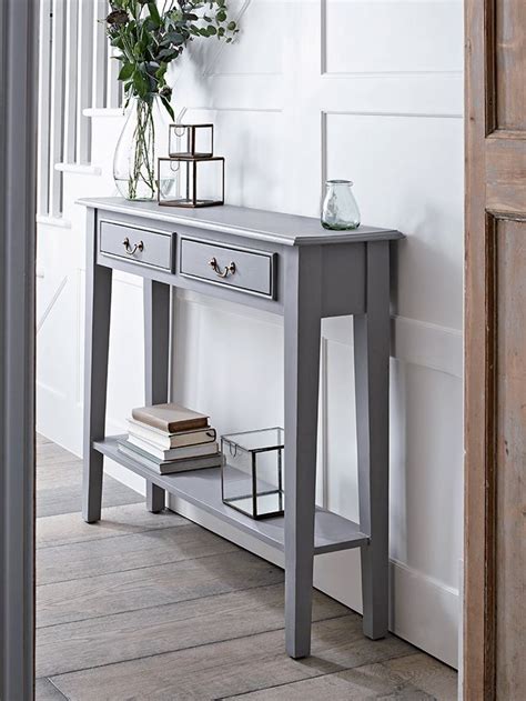 With a warm grey painted finish and two slender drawers with simple brass… | Decoração de ...