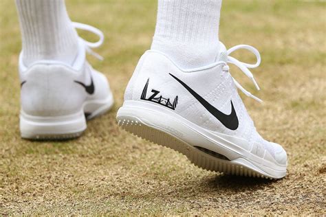 Roger Federer is still wearing personalized Nike shoes at Wimbledon ...