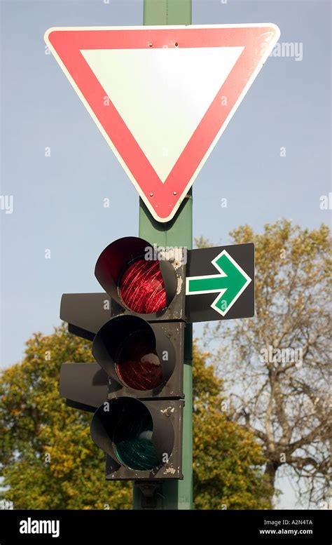 traffic light with a green arrow Stock Photo - Alamy