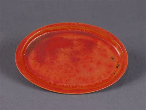 Oval uranium glaze plate c1920; 1920; 1992 | eHive