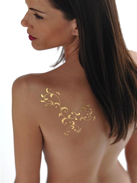 Order these stunning Gold Tattoos at GoldTattoosUS.com | Gold tattoo, Gold tattoo ink, Metal tattoo