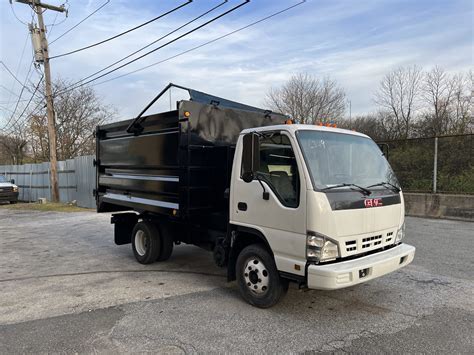 GMC 15 Yard Junk Hauler Dump Truck - TA Truck Sales Inc.