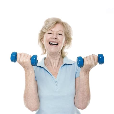 Senior Woman Lifting Weights Photograph by