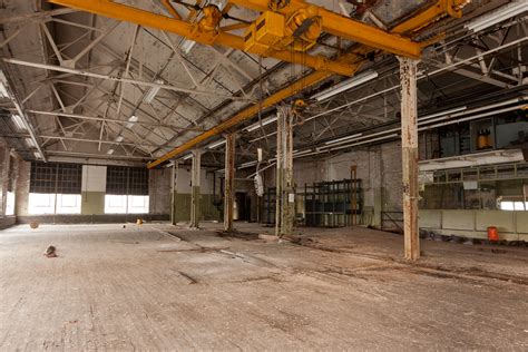 Rafters and hardwood floors. Factory floor. Abandoned Barb… | Flickr