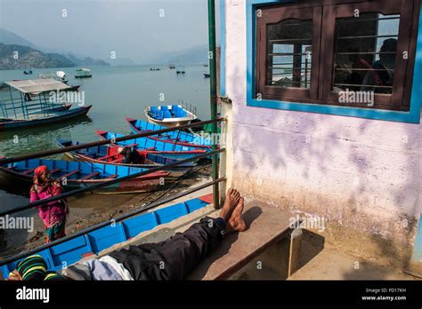 Nepal, Pokhara, local lake, boats Stock Photo - Alamy