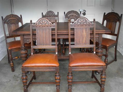 Antique English Oak Dining Table and 6 chairs with leather bottoms | InstAppraisal