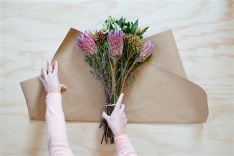 The Secret to Wrapping a Basic Bouquet so It Looks Beyond Lovely | Hunker | How to wrap flowers ...