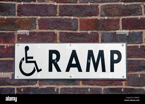 Wheelchair ramp sign Stock Photo - Alamy