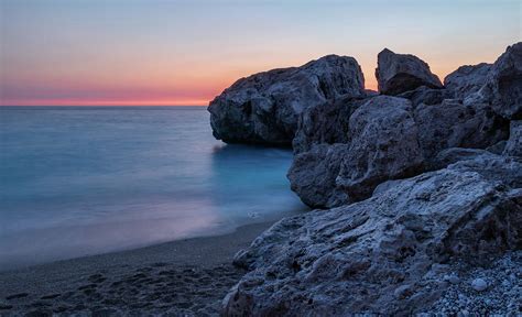 Sunset photo of beautiful Kathisma beach, Lefkada, Ionian islands, Greece. Long exposure beach ...