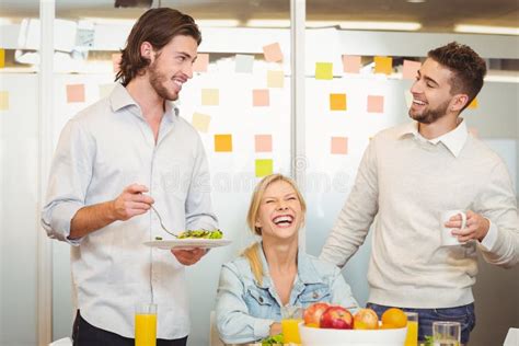 Employees Having Fun during Breakfast Stock Image - Image of casual, bowl: 60556209