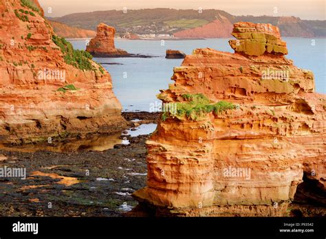 Impressive red sandstones of the Ladram bay on the Jurassic coast, a World Heritage Site on the ...