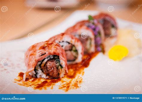 Japanese Wagyu Beef Sushi Maki Rolls on Ceramic Plate Stock Image ...