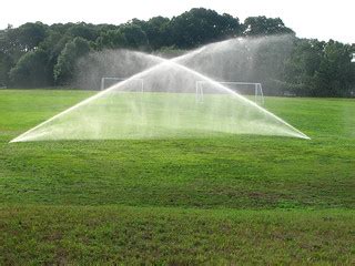 soccer field sprinkler | Early morning sprinklers, getting t… | Flickr