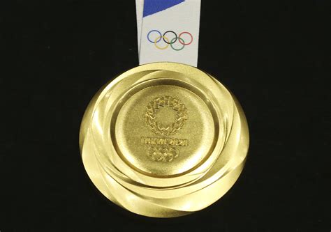 1 Year: Tokyo Olympics unveil gold, silver, bronze medals